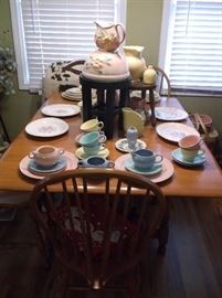 LuRay and other American dinnerware on maple drop leaf table with four Tell City windsor style chairs