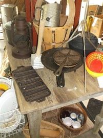 Primitive barn wood table, cast iron, lantern