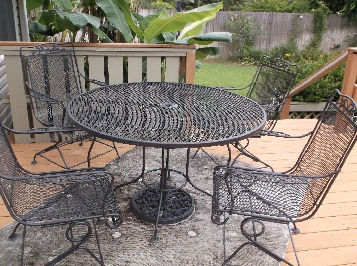Outdoor round table and four chairs