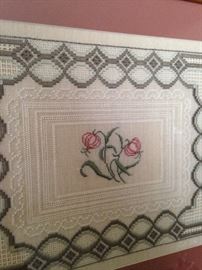 A sample of the numerous framed needlework selections