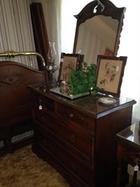 The dresser also matches the twin beds, nightstand, chest, and twin beds.