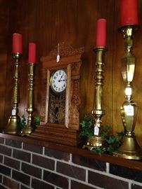 Four tall brass candlesticks; another lovely mantel clock