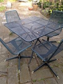 Square patio table and 4 swival chairs