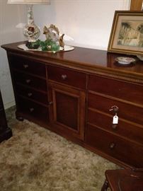 Long dresser has matching small chest.