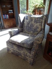 Blue and white wing back chair