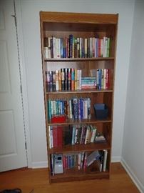 Tall book case and books