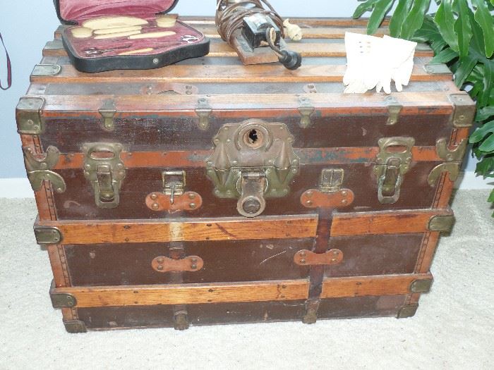 Vintage steamer trunk  -put a sheet of heavy glass on top- Coffee Table!