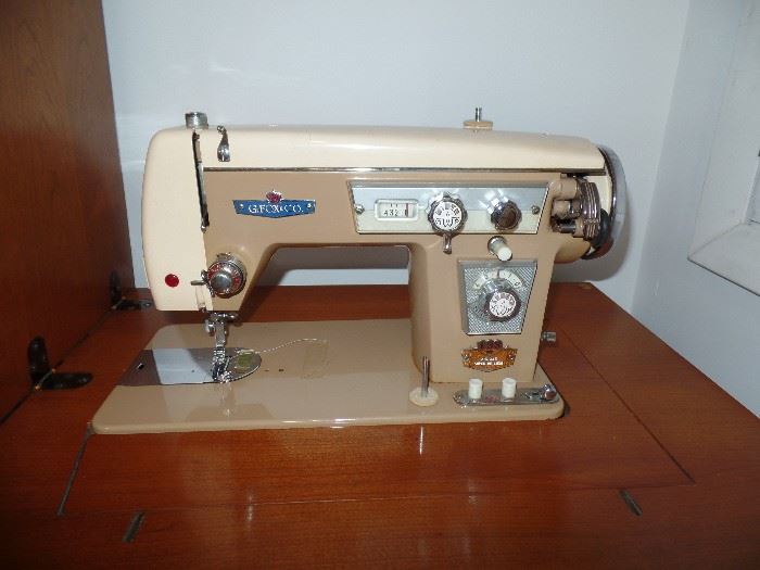 G. Fox & Co. sewing machine and cabinet