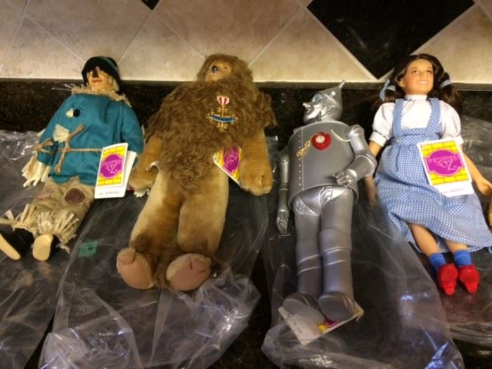SET OF 4 VINTAGE WIZARD OF OZ DOLLS BY "PRESENTS. DOROTHY, SCARECROW, TIN MAN AND LION - NEVER PLAYED WITH