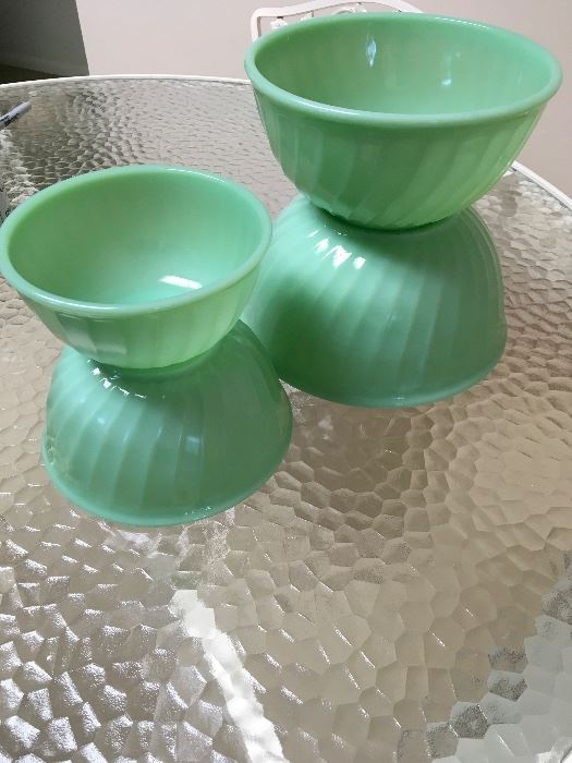 Stack of 4 nested Fire King jadeite mixing bowls 