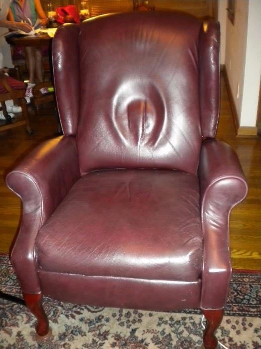 Leather wing back recliner x2, rug not for sale