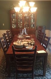 Dining table and 8 ladderback chairs (chairs sold separately)