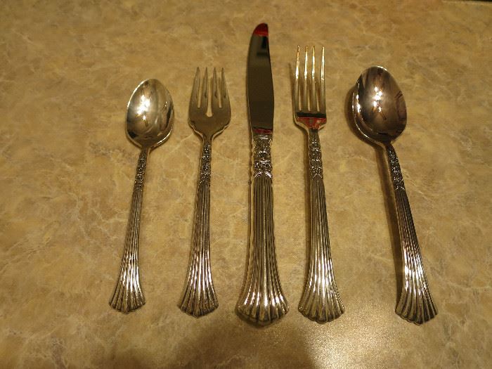 This is Lovely Flatware. Floral Queen (Silverplate, 1992) by Oneida.  We have a set. 
