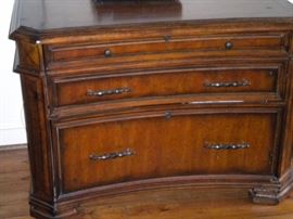 Executive desk, executive leather nail head trim office chair, and executive lateral file cabinet