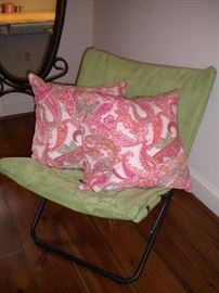 Cheval mirror, a full-length floor-standing mirror mounted in a frame that allows it to swing freely, Fold up indoor casual chair.