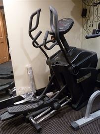 The Q35x cross-training standing home elliptical machine from Octane Fitness offers the same high-end performance features and exceptional quality at an unbeatable value for home exercisers. Included are the natural, smooth motion that Octane is known for, digital contact heart rate sensors and four goal programs that let you take on a 10K or half-marathon, or blast 350 or 750 calories. Retails $2000