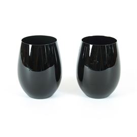 Riedel Black Crystal Wine Glasses: A pair of Riedel black crystal wine glasses. These glasses feature a solid design and are marked to the underside.