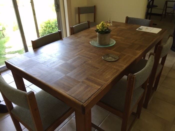 Wonderful sturdy table with eight matching chairs            73" X 37" X 30"