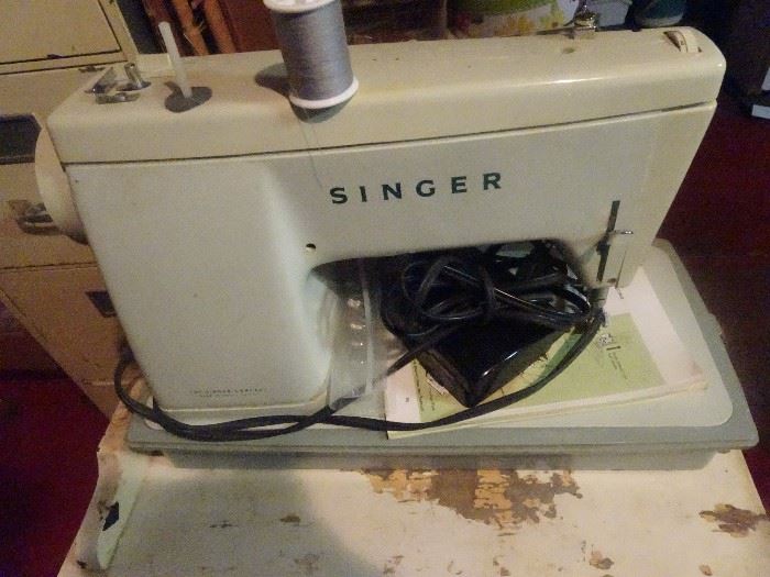 Singer Sewing Machine & other sewing supplies
