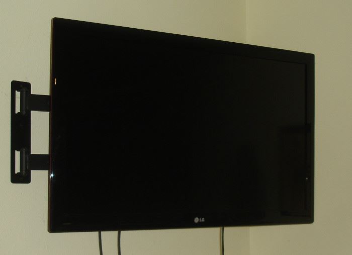 LG flat screen TV with wall mount