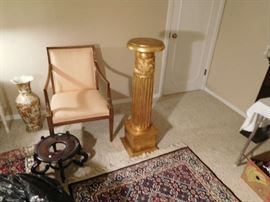 gold leaf pedestal ,chair,rug