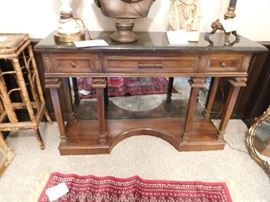 marble top table with mirror on lower half