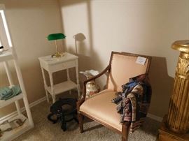 small white table and green desk lamp