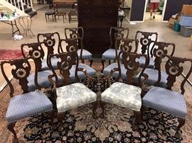Set of twelve dining chairs.
