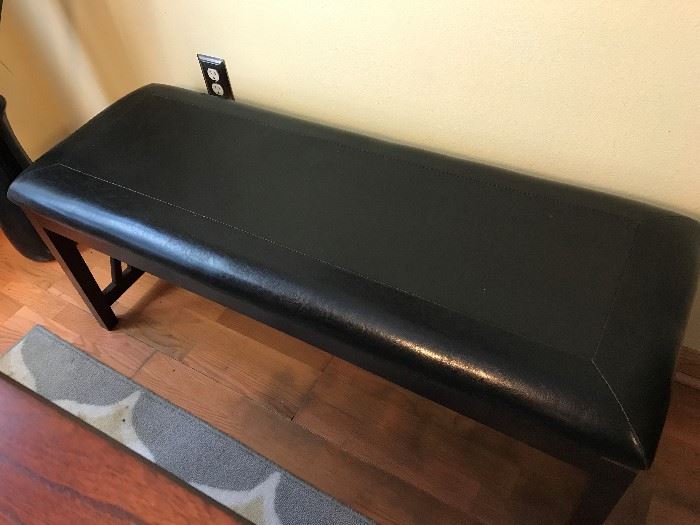 Bench with faux leather.  Nice for Dining Room Table or other