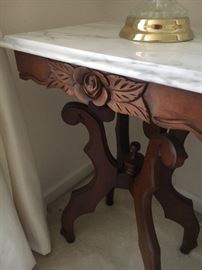 There are two of these Mahogany/Marble end tables in excellent condition.