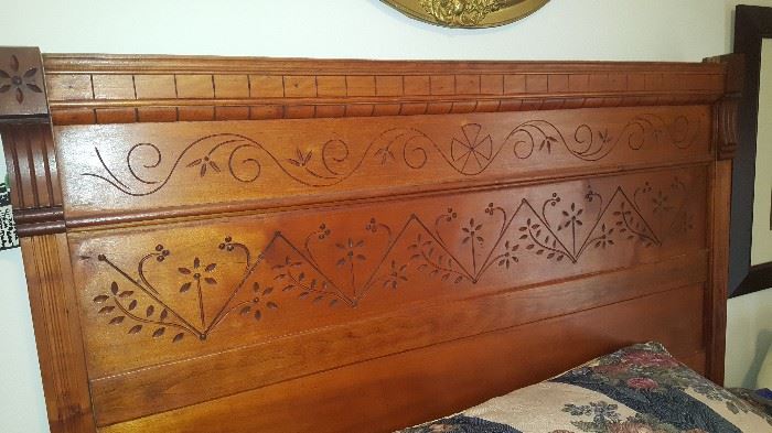 Intricately carved headboard