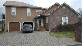 Photo of Pigeon Forge Home. We have an upper and lower garage. This is three stories of home,
filled with treasures overlooking the Smokys.