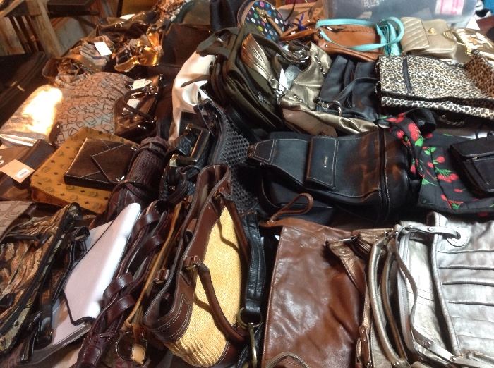 The lady liked purses!!  Many still have the tags on them