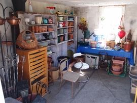 Pots and gardening supplies galore in the garden shed! Drafting cabinet and supplies!