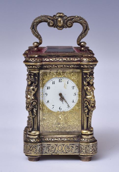 Miniature Renaissance Revival Carriage Clock
with figural columns
3" high excluding handle
with original carrying case and key