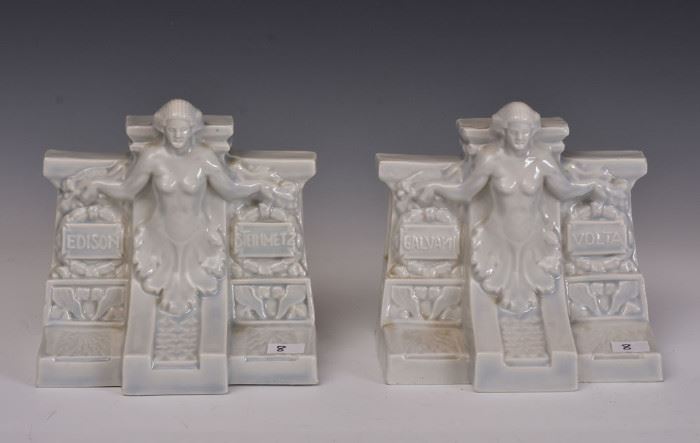 Pair of Porcelain Edison Bookends
a tribute to the pioneers of electricity
with Steinmetz, Galvani, Volta and Edison
5 1/2" high, 6 1/2" long
early 20th century