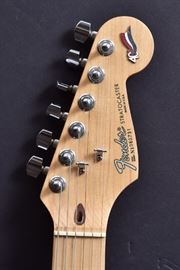 Fender Stratocaster Electric Guitar	
40th Anniversary Edition, 1994
38 1/2" long overall
with hard case