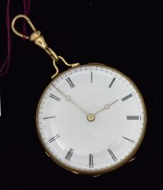 18k Gold Open Face Pocket Watch 	
with floral engraved back,
signed E. Chappement, possibly French
1 1/2" diameter, 22.5 dwt gross