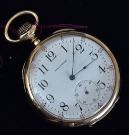 Waltham 14k Gold Pocket Watch 	
open face with secondary dial
1 1/2" diameter, 39.3 dwt gross
early 20th century