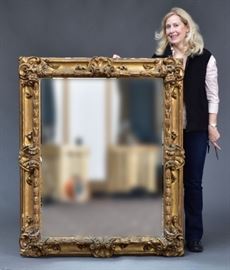 Large Giltwood Painting Frame	
now fitted with mirror
54" x 44" overall, rabbet: 42 1/2" x 33 1/4"
mid-19th century