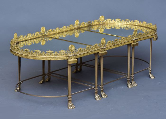 French Louis XV Style Gilt Bronze Plateau
in three sections
61" x 26 1/2", 19 1/2" high
later adapted to a coffee table
late19th century
