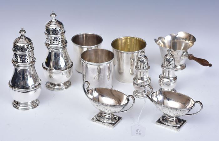 Group of Silver
including three coin silver tumblers,
two English sterling sweetmeats, 
two sterling casters, two salts and
a wood handled sterling Cartier pourer
38.5 troy ounces (excluding the pourer)