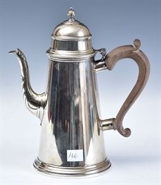 Cartier Sterling Silver Tea Pot 	
9" high
model 1718, stamped "Cartier/
reproduction circa 1712"
19.2 troy ounces gross