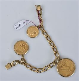 14k Gold Bracelet with American Coins	
with 1912 $10, 1910 $5 and 1914 $2 1/2
gold coins on a 14k gold bracelet
7" long, 34.7 dwt gross