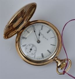 Elgin 14k Gold Pocket Watch 	
engraved floral hunters case
1 1/4" face, 33.4 dwt gross
early 20th century