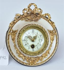 French Alabaster Table Clock
with enameled face and gilt mounts
with bronze easel back, 6" high
early 20th century