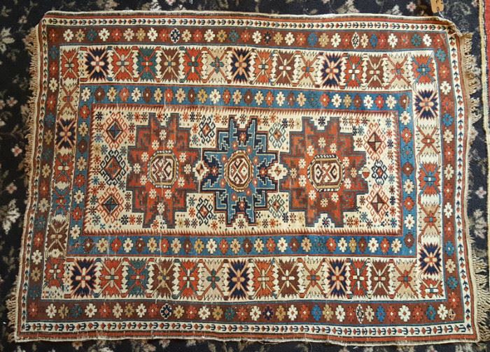Caucasian Carpet	
3' 5" x 4' 5"
early 20th century