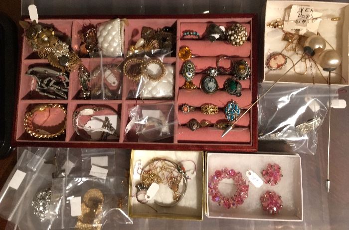A lot of true vintage & Art Deco jewelry. Some Sterling, some gold, pearls, hat pins, rings, watches, fine assortment.
