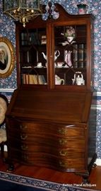 Serpentine Front early 20th century Mahogany Secretary, standing 85 inches to top of finial, width 42 inches , and depth 20 inches.
