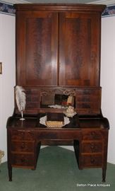 Mid 19th Century Flame Mahogany Plantation Desk, lift up center in base, drawers near both legs, Sheraton Style, just a beautiful large piece. Measurements 90 inches tall, width at widest point on base is 48 inches, depth at base is 31 inches.